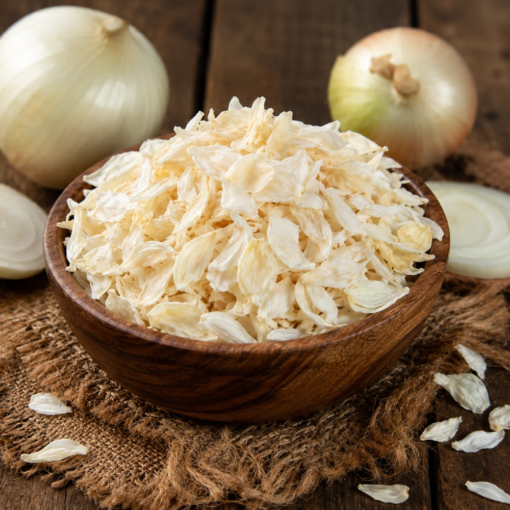 Dehydrated White Onion Flakes Exporter and Supplier from India